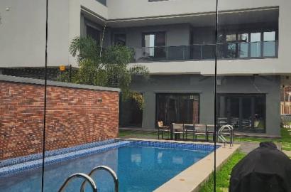Luxury fully furnished 2wing duplex of 11 bedrooms total with bq, gate house, swimming pool, gym, cinema, and all modern facilities.  House is fully automated with a remote.Price: 2 million USD